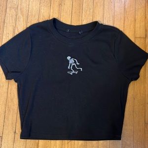 Black Crop Top—Skeleton riding Skateboard, tag cut out but probably from PacSun